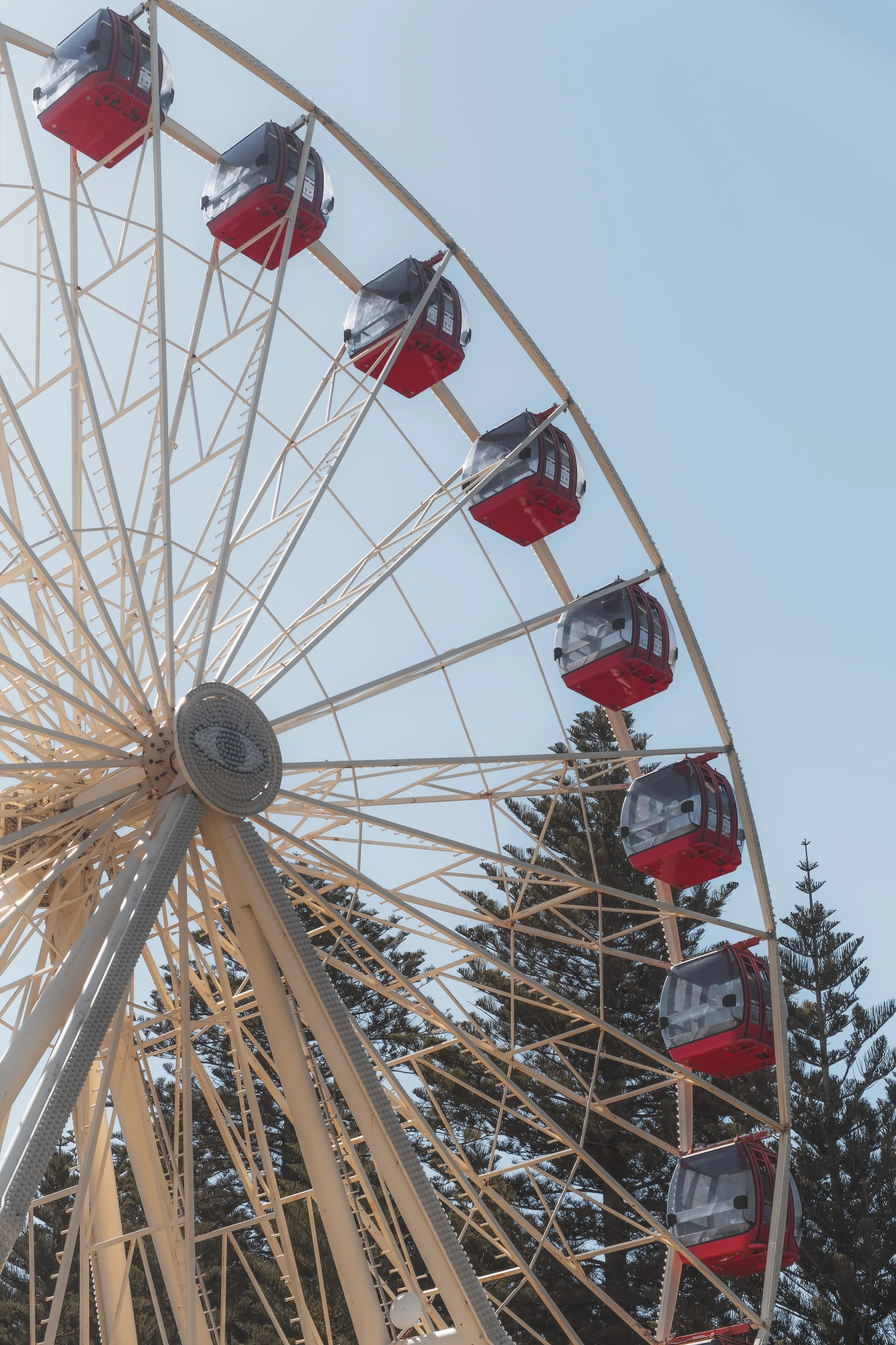 Red Gondolas Against a Pale Sky